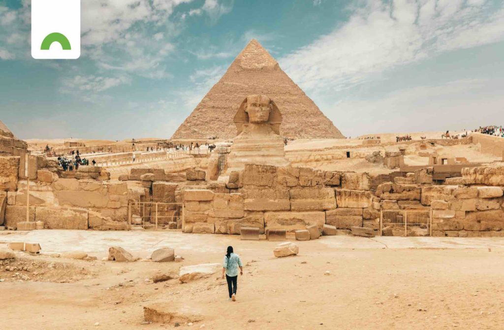 tourist at sphinx and pyramid